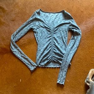 Small cropped long sleeve shirt